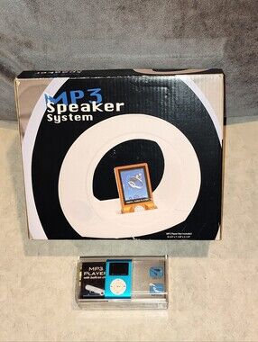 GLOBAL ROUND MP3 PLAYER / CELLPHONE SPEAKER SYSTEM DOCK FREE MP3 PLAYER